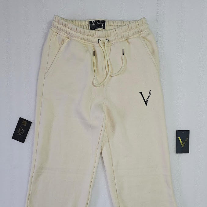 Beige sweatpants with a logo on a white background