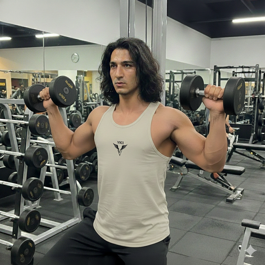 man in gym working out wearing Vici bone colored stringer 